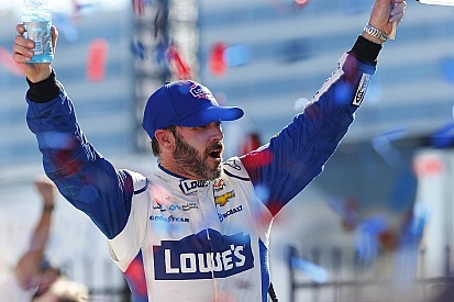 Jimmie Johnson survives the carnage, wins at Charlotte