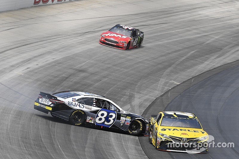 Suarez avoids carnage for career-best finish at Dover