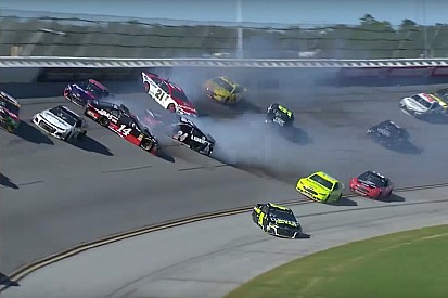 Johnson and teammate Byron collide, igniting 14-car wreck - video