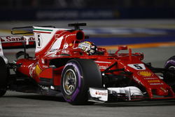 Pole man Sebastian Vettel, Ferrari SF70H, celebrates on his way to Parc Ferme