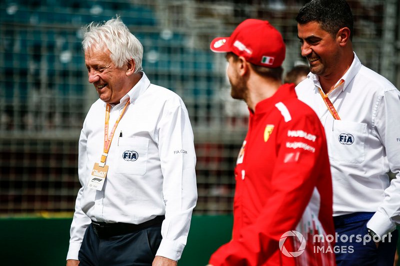 Charlie Whiting, Race Director, FIA, withSebastian Vettel, Ferrari