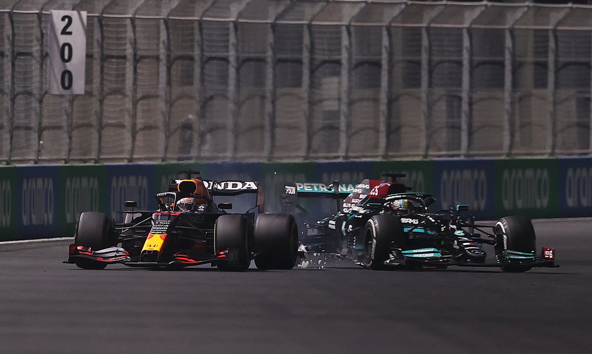 Lewis Hamilton, Mercedes, hits Max Verstappen, Red Bull Racing