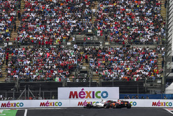 Lance Stroll, Williams FW40 and Sebastian Vettel, Ferrari SF70H