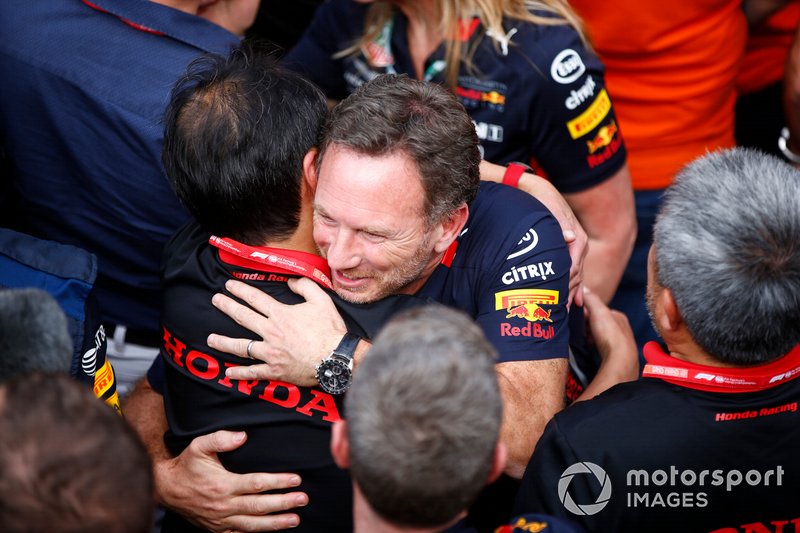 Toyoharu Tanabe, F1 Technical Director, Honda, and Christian Horner, Team Principal, Red Bull Racing, celebrate in Parc Ferme