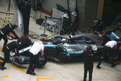 Lewis Hamilton, Mercedes AMG F1 W09, is returned to the garage