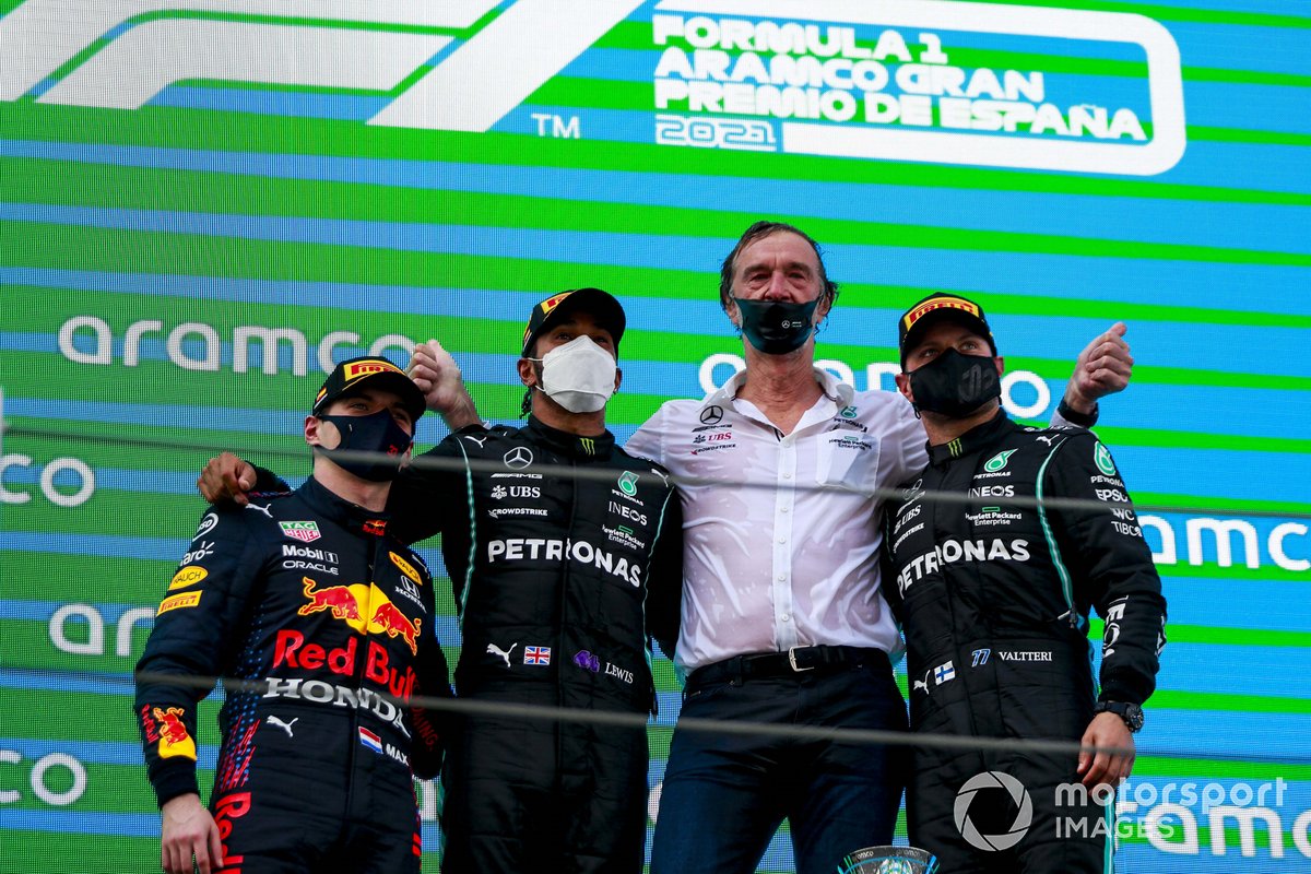 Max Verstappen, Red Bull Racing, 2nd position, Lewis Hamilton, Mercedes, 1st position, the Mercedes trophy delegate and Valtteri Bottas, Mercedes, 3rd position, on the podium