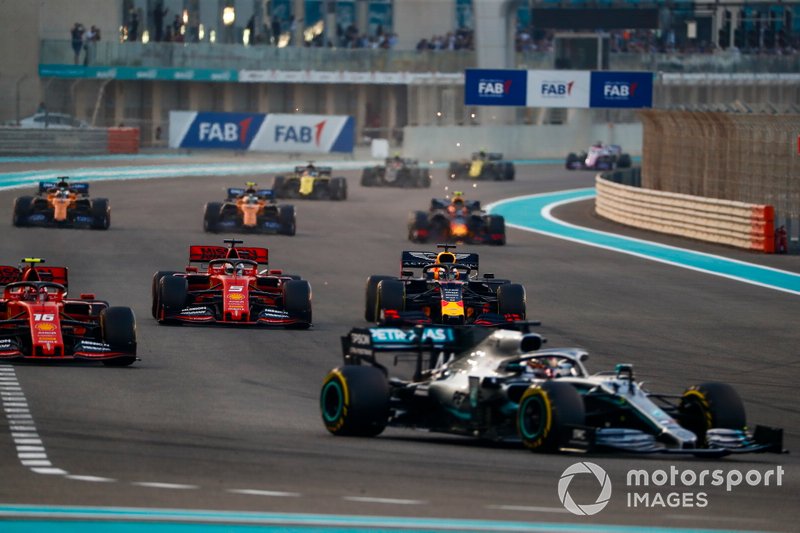 Lewis Hamilton, Mercedes AMG F1 W10, leads Charles Leclerc, Ferrari SF90, Sebastian Vettel, Ferrari SF90, Max Verstappen, Red Bull Racing RB15, and the rest of the field on the opening lap