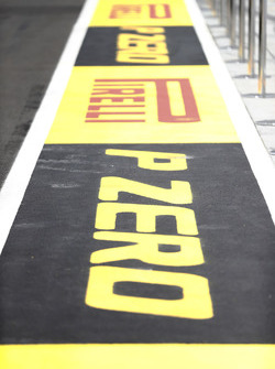 Pirelli branding in the pit lane