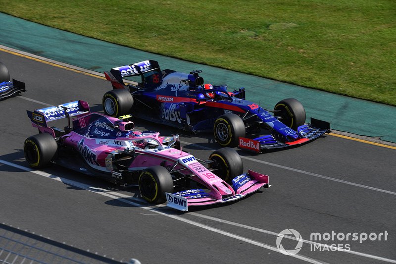 Lance Stroll, Racing Point RP19, battles with Daniil Kvyat, Toro Rosso STR14, at the start