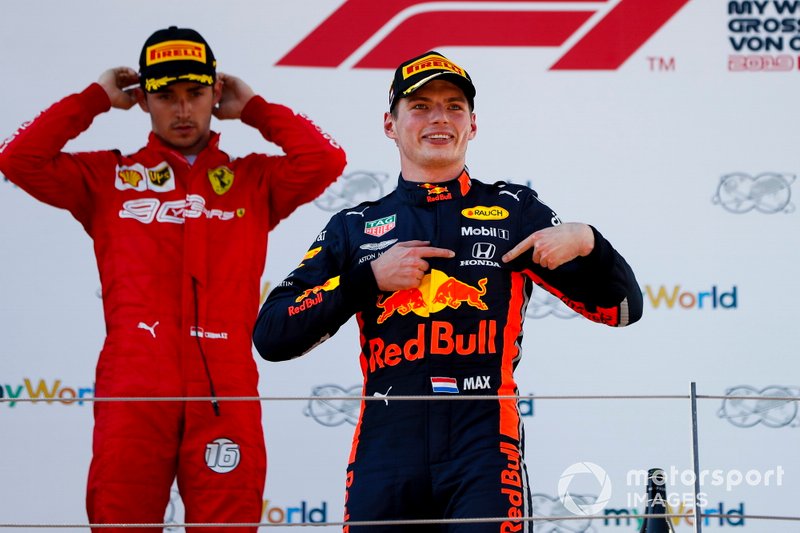 Race winner Max Verstappen, Red Bull Racing celebrates on the podium with Charles Leclerc, Ferrari