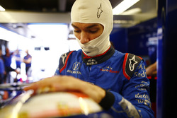 Pierre Gasly, Toro Rosso, adjusts his helmet.