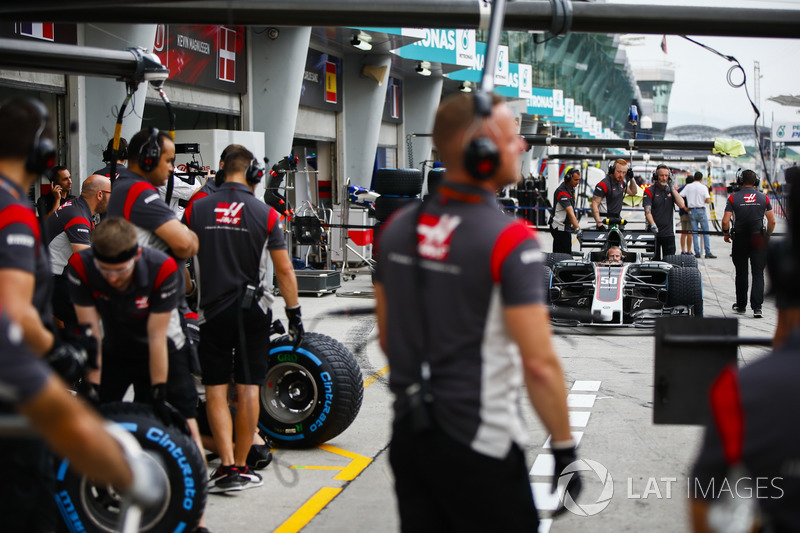 Engineer sat in the cockpit of the Haas F1 Team VF-17