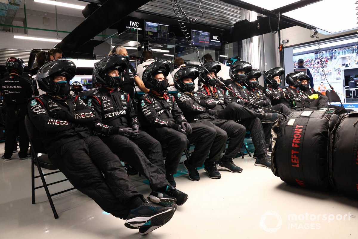 The Mercedes pit crew in the garage