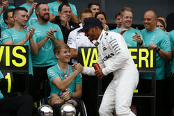 Race winner Lewis Hamilton, Mercedes AMG F1, celebrates with Billy Monger and the team