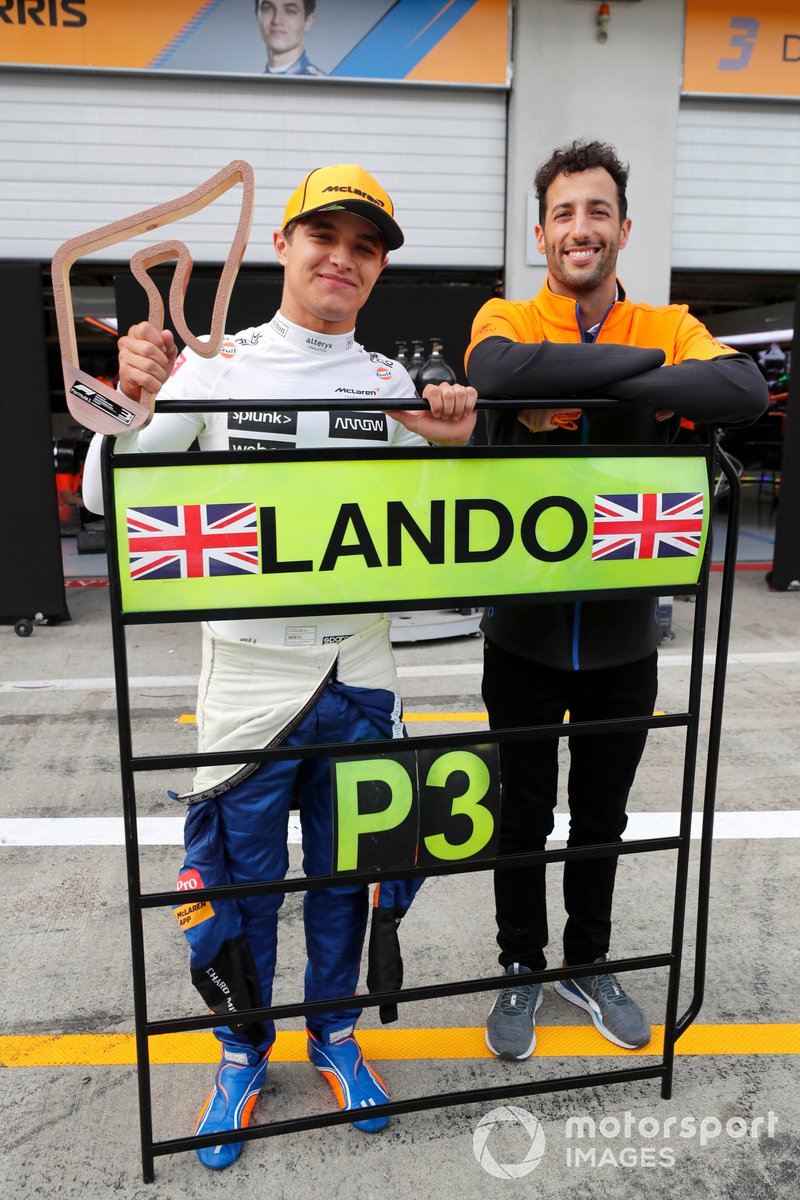 Lando Norris, McLaren, 3rd position, and Daniel Ricciardo, McLaren , celebrate with the McLaren team after the race