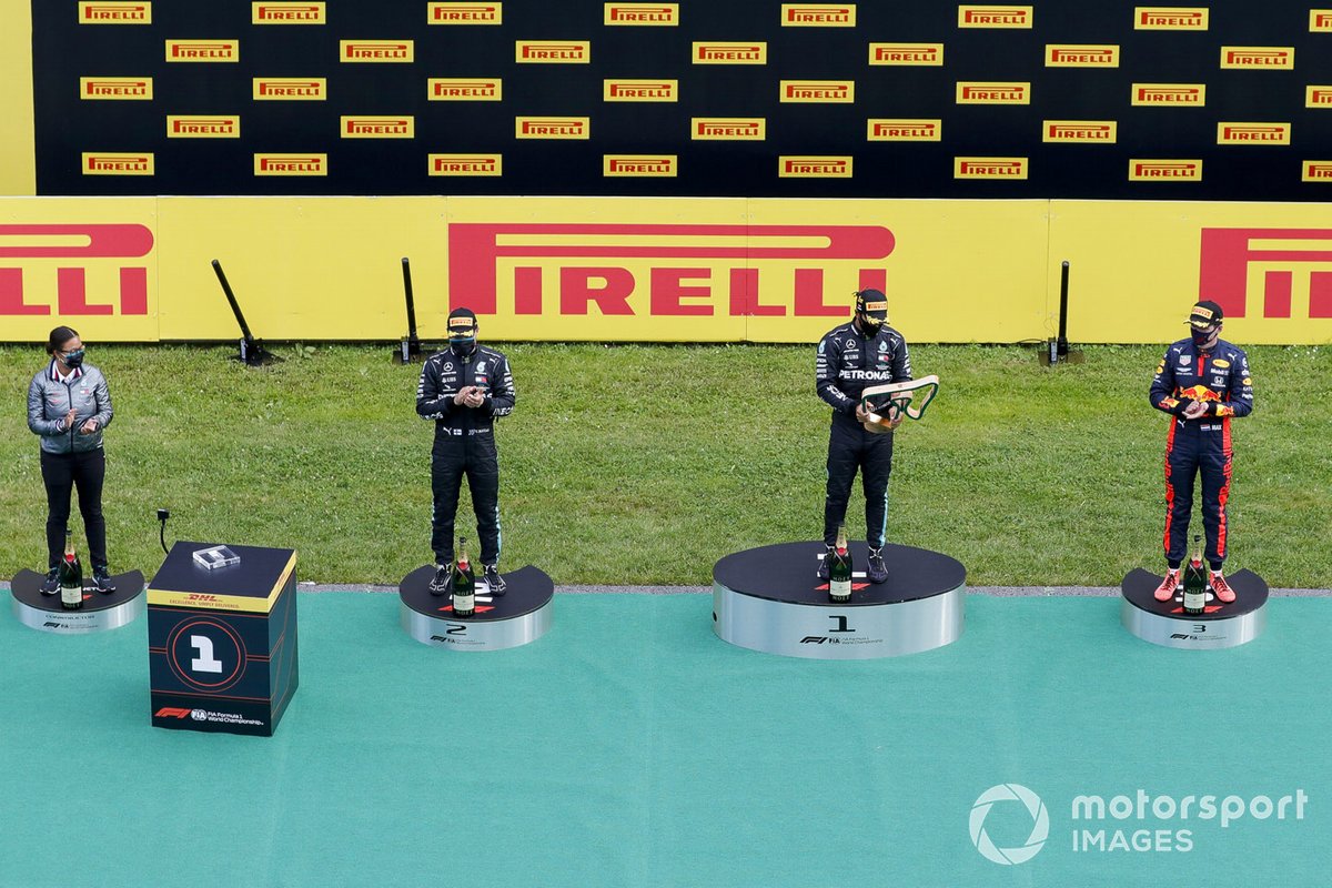 Valtteri Bottas, Mercedes-AMG Petronas F1, Race Winner Lewis Hamilton, Mercedes-AMG Petronas F1 and Max Verstappen, Red Bull Racing celebrate on the podium with the trophy