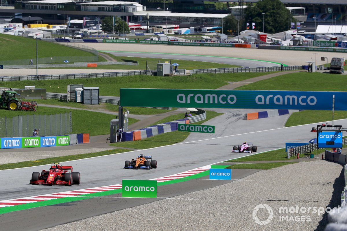 Charles Leclerc, Ferrari SF1000, leads Carlos Sainz Jr., McLaren MCL35, and Lance Stroll, Racing Point RP20