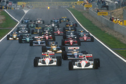 Start: Gerhard Berger, McLaren MP4/6 Honda leads Ayrton Senna, McLaren MP4/6 Honda, Nigel Mansell, W