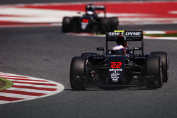 Jenson Button, McLaren MP4-31 on track ahead of Fernando Alonso, McLaren MP4-31