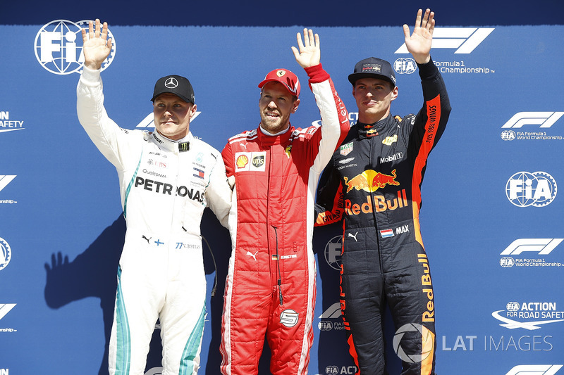 Start tiga besar: 1. Sebastian Vettel, 2. Valtteri Bottas, 3. Max Verstappen