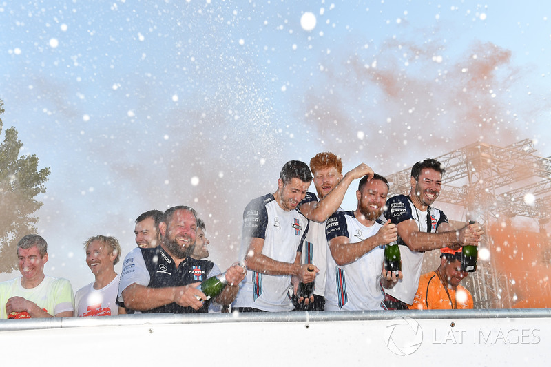 Williams celebrate on the podium at the raft race