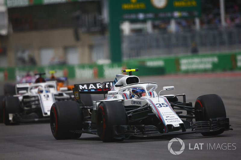 Sergey Sirotkin, Williams FW41, leads Marcus Ericsson, Sauber C37
