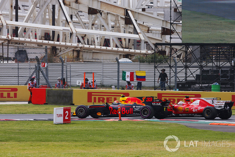 Max Verstappen, Red Bull Racing RB13 y Sebastian Vettel, Ferrari SF70H