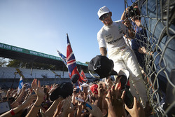 Lewis Hamilton, Mercedes AMG F1, signs autographs for fans