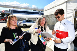 Charles Leclerc, Alfa Romeo Sauber F1 Team signs autographs for his fans