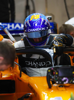 Fernando Alonso, McLaren, climbs out of his car