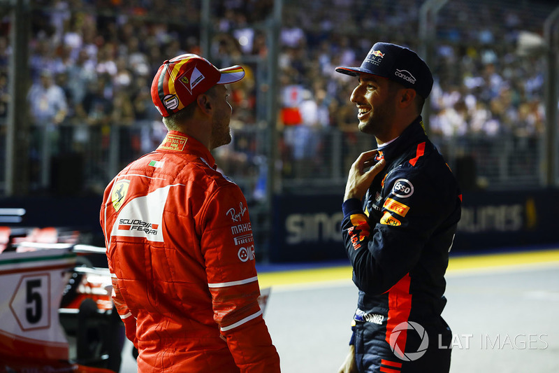 Pole sitter Sebastian Vettel, Ferrari, third place Daniel Ricciardo, Red Bull Racing