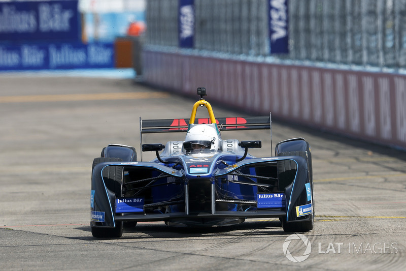 Model Emily Ratajkowski, drives the Formula E track car