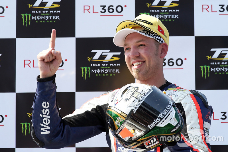 Peter Hickman celebrates winning the RL360º Superstock TT race