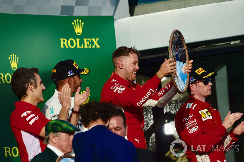 Lewis Hamilton, Mercedes-AMG F1, Sebastian Vettel, Ferrari and Kimi Raikkonen, Ferrari celebrate on