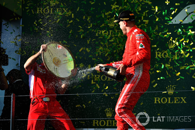 Race winner Sebastian Vettel, Ferrari celebrates with the champagne on the podium