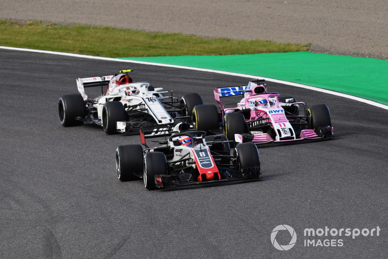 Ромен Грожан, Haas F1 Team VF-18, Серхіо Перес, Racing Point Force India VJM11 та Шарль Леклер, Sauber C37 battle