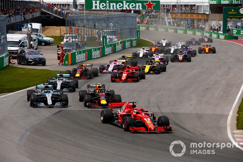 Себастьян Феттель, Ferrari SF71H, лідирує на старті гонки