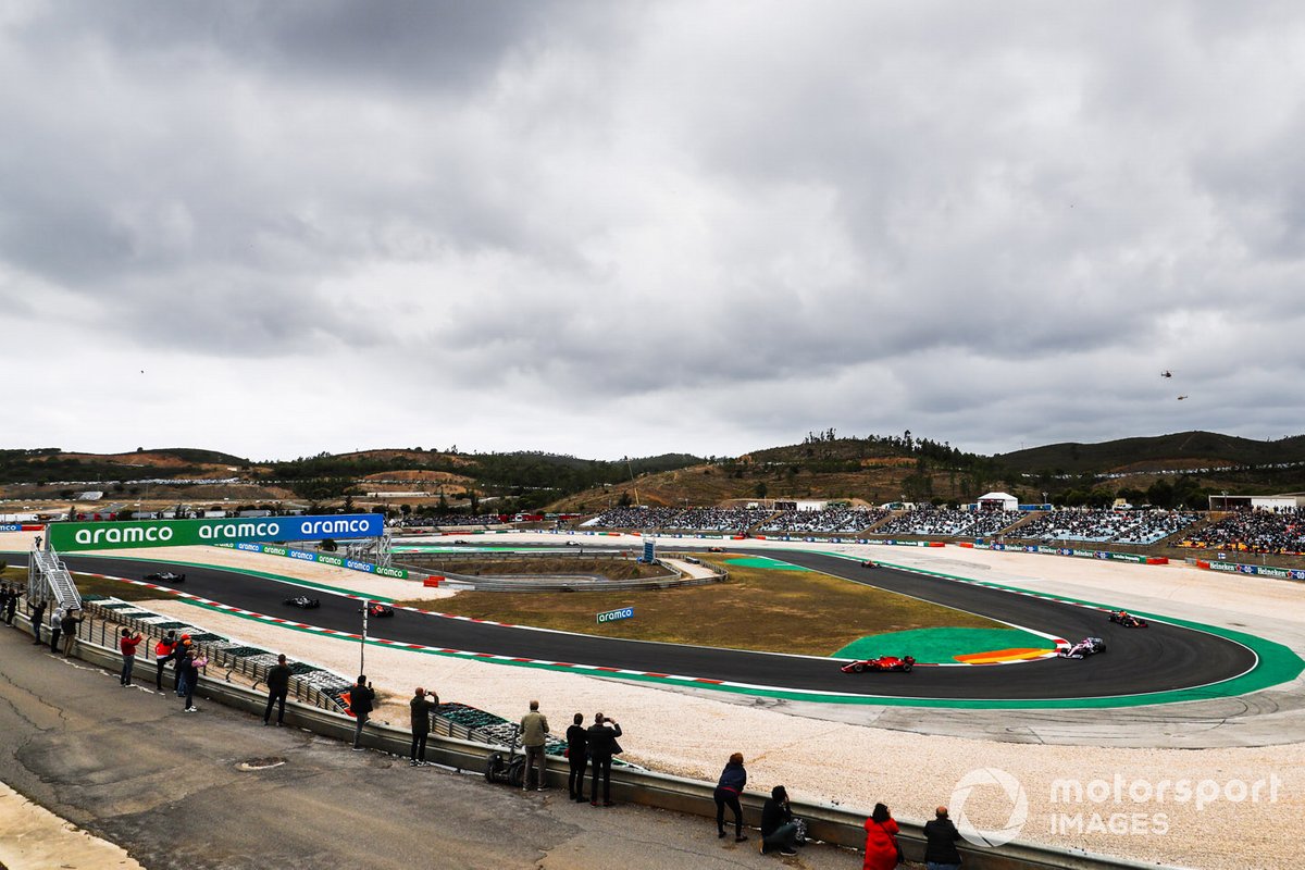 Lewis Hamilton, Mercedes F1 W11, Valtteri Bottas, Mercedes F1 W11, Max Verstappen, Red Bull Racing RB16, and the rest of the field to the grid