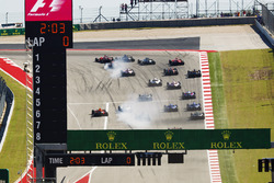 Sebastian Vettel, Ferrari SF70H, into the first corner at the start of the race