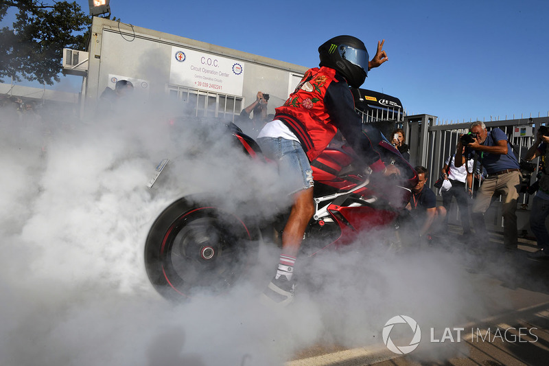 Lewis Hamilton, Mercedes AMG F1 does a burnout on his motorbike