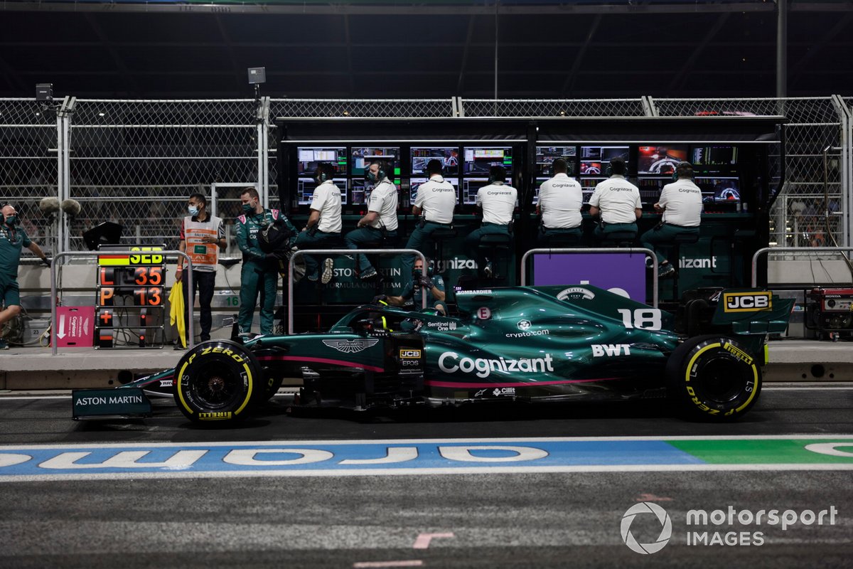 Lance Stroll, Aston Martin AMR21, in the pit lane