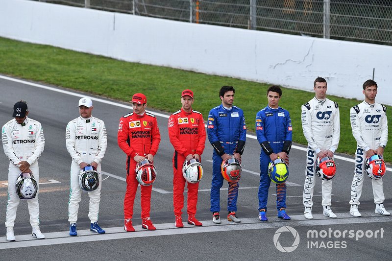 Lewis Hamilton, Mercedes-AMG Petronas F1, Valtteri Bottas, Mercedes-AMG Petronas F1, Charles Leclerc, Ferrari, Sebastien Vettel, Ferrari, Carlos Sainz, McLaren, Lando Norris, McLaren, Daniel Kvyat, AlphaTauri, and Pierre Gasly, AlphaTauri line up on the track