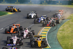 Nico Hulkenberg, Renault Sport F1 Team RS17, leads Sergio Perez, Force India VJM10, Esteban Ocon, Fo