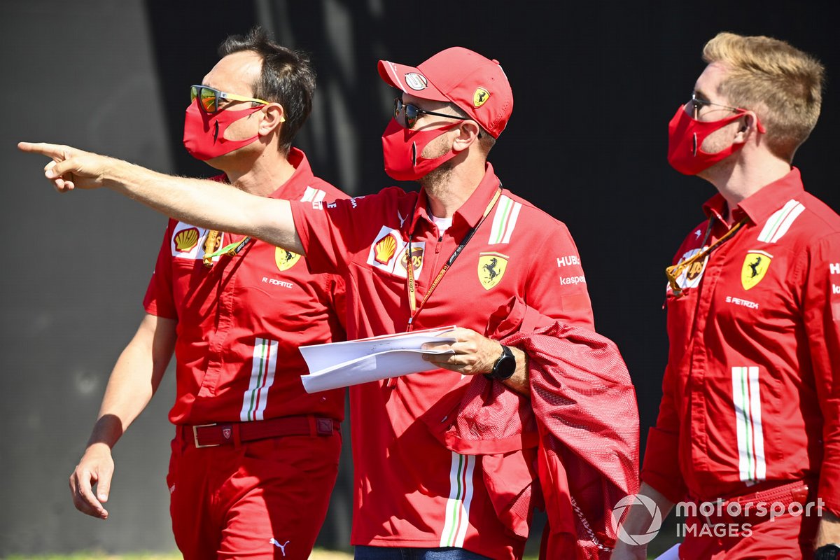 Sebastian Vettel, Ferrari walks the track with his engineers