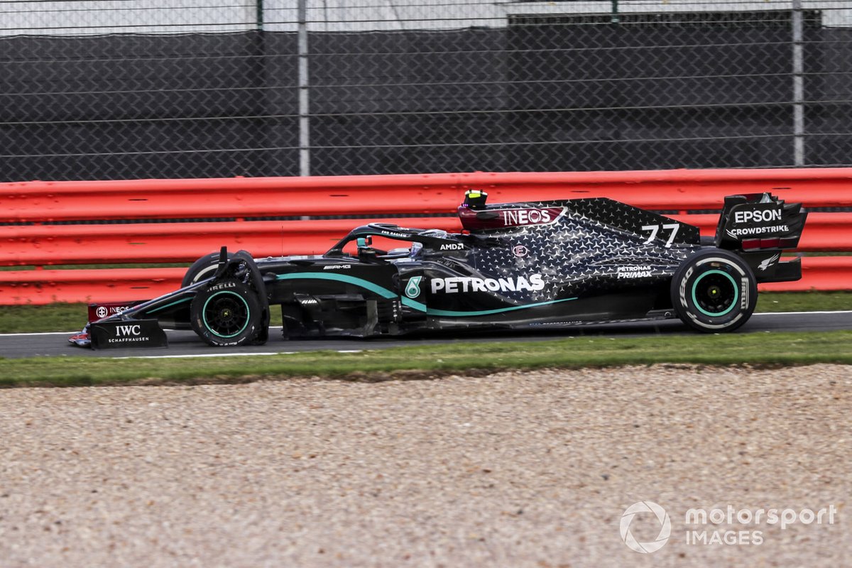 Valtteri Bottas, Mercedes F1 W11 coming into pit with a puncture