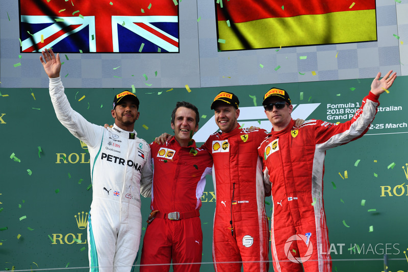 Lewis Hamilton, Mercedes AMG F1, 2nd position, Inaki Rueda, Race Strategist, Ferrari, Sebastian Vettel, Ferrari, 1st position, and Kimi Raikkonen, Ferrari, 3rd position, on the podium
