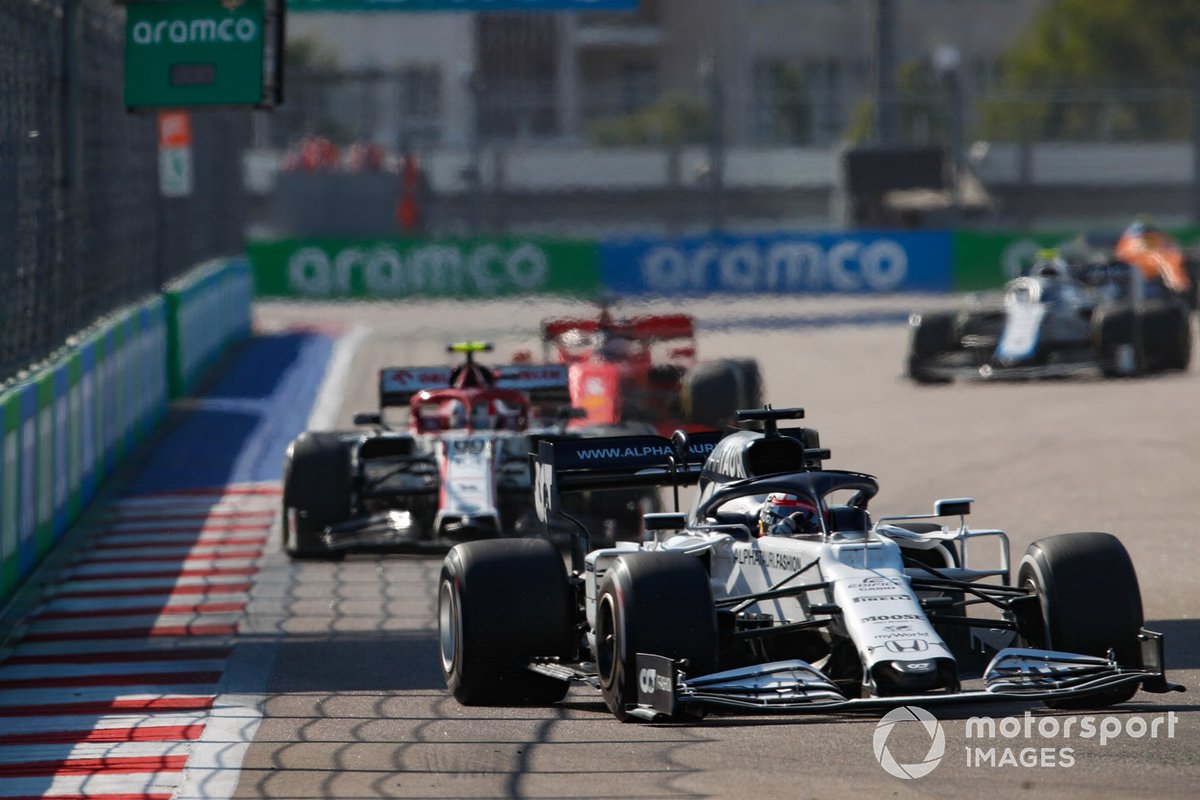 Daniil Kvyat, AlphaTauri AT01, Antonio Giovinazzi, Alfa Romeo Racing C39, and Sebastian Vettel, Ferrari SF1000