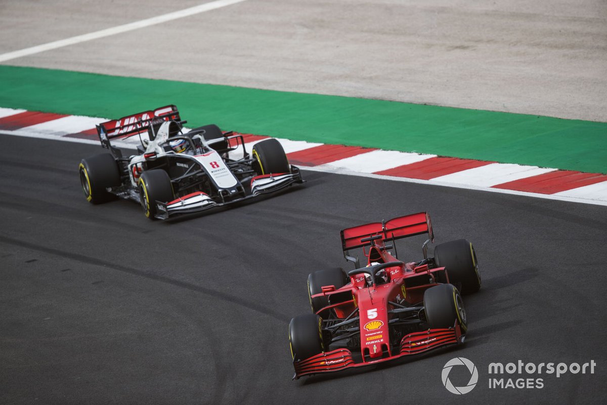 Sebastian Vettel, Ferrari SF1000, Romain Grosjean, Haas VF-20