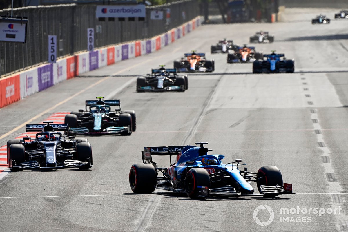Fernando Alonso, Alpine A521, Yuki Tsunoda, AlphaTauri AT02, Sebastian Vettel, Aston Martin AMR21,and Valtteri Bottas, Mercedes W12