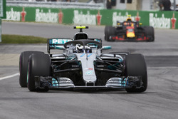 Valtteri Bottas, Mercedes AMG F1 W09, leads Max Verstappen, Red Bull Racing RB14